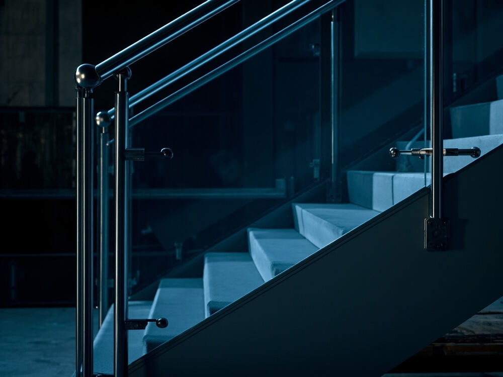Stainless steel railing with glass panels